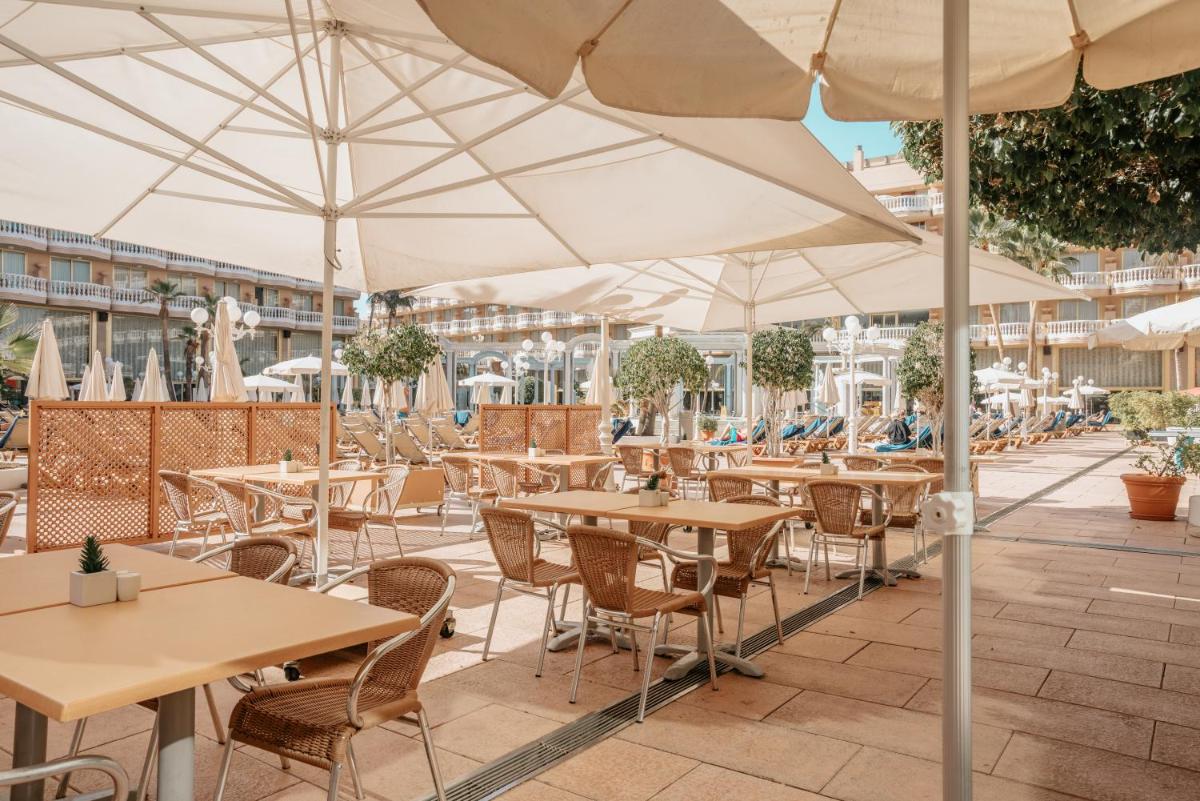 Un restaurante o sitio para comer en Hotel Cleopatra Palace