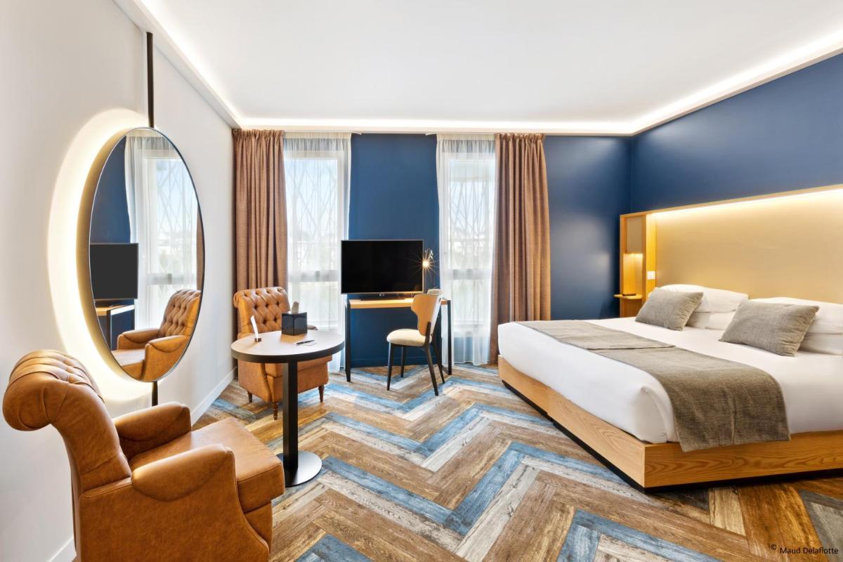 Un ou plusieurs lits dans un hébergement de l'établissement Aiden by Best Western T'aim Hotel & SPA