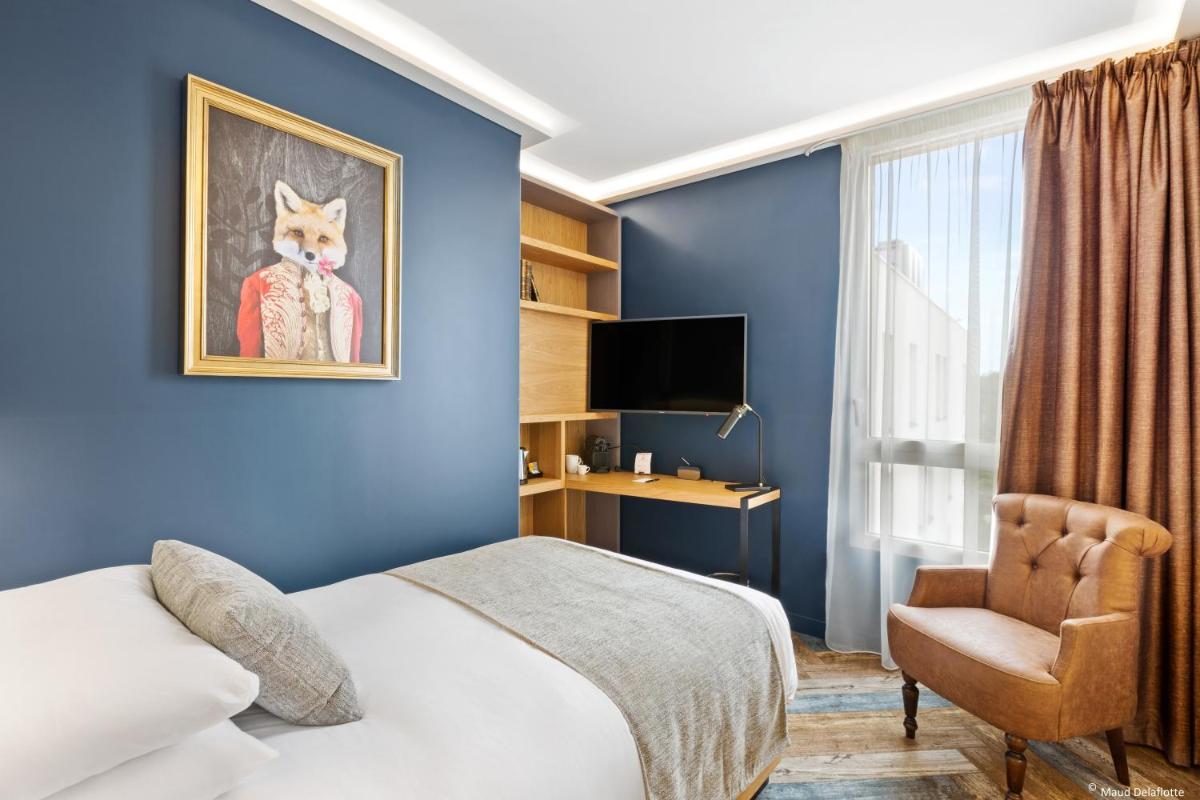 Télévision ou salle de divertissement dans l'établissement Aiden by Best Western T'aim Hotel & SPA