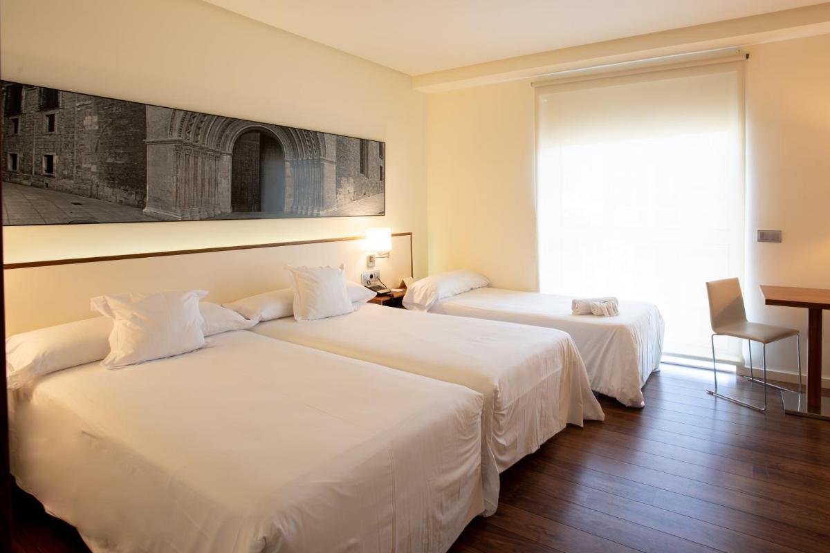 Cama o camas de una habitación en Primus Valencia