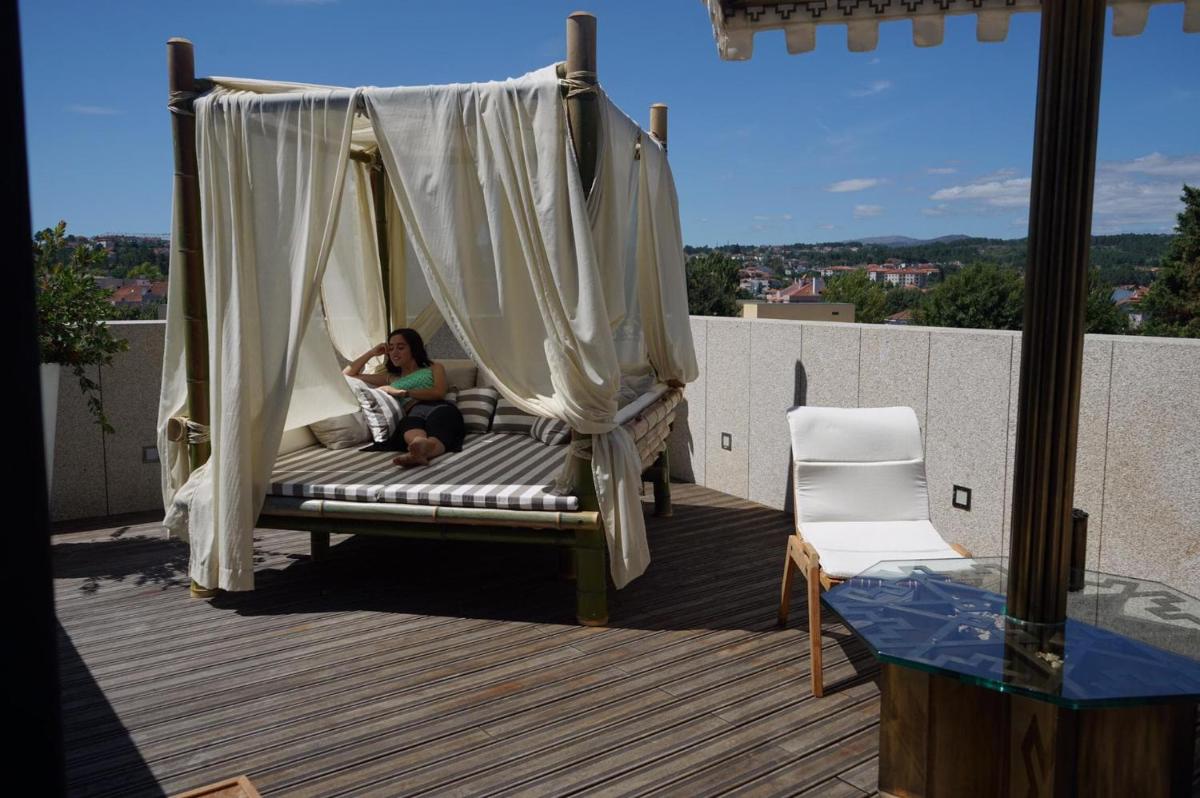 Uma varanda ou terraço em Castelo Hotel