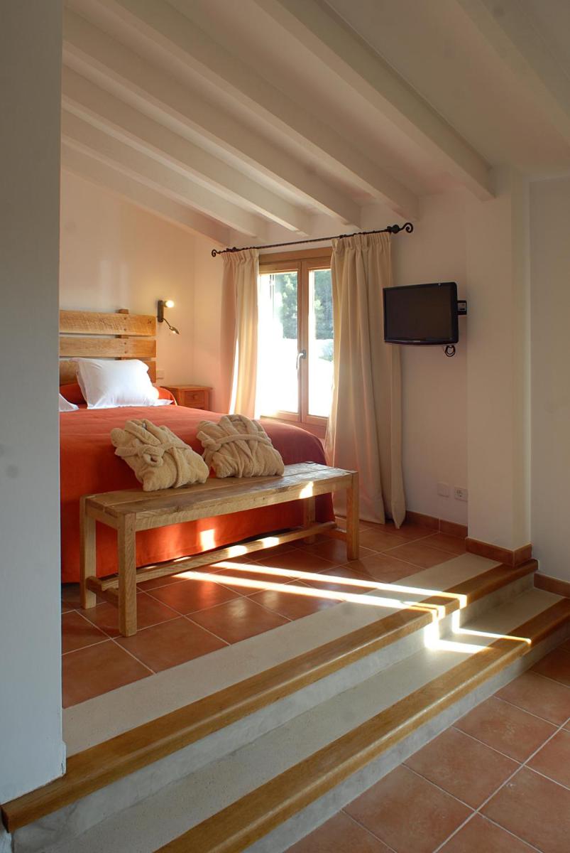 Cama o camas de una habitación en Hotel Es Port