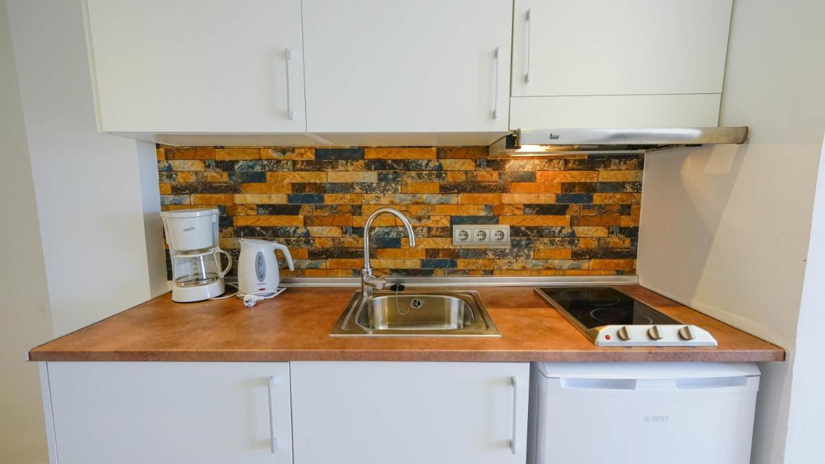 Una cocina o zona de cocina en Houm Plaza Son Rigo
