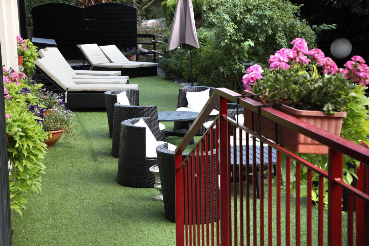 Jardin de l'établissement Hotel de la Jamagne & Spa