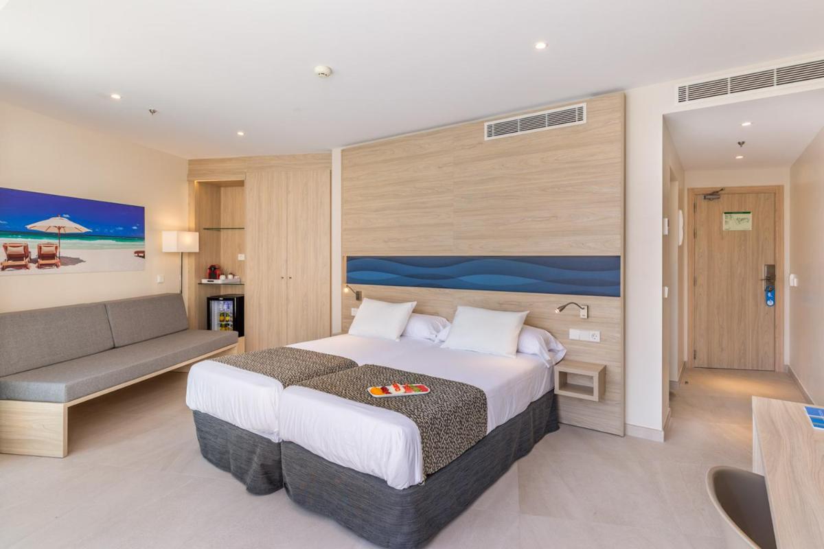 Cama o camas de una habitación en Hotel Samos