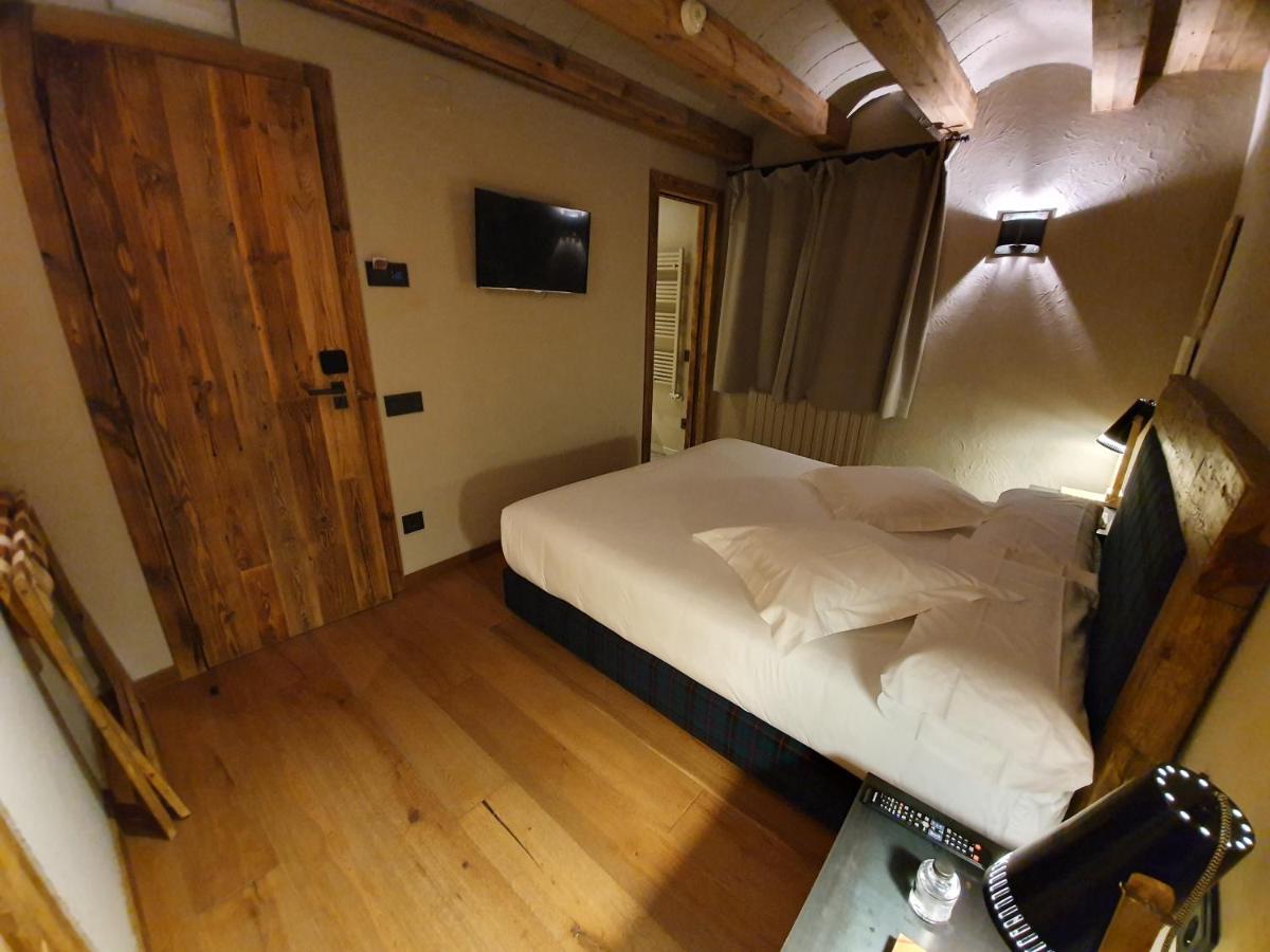 Cama o camas de una habitación en Hotel Boutique Puig Francó - Adults Only
