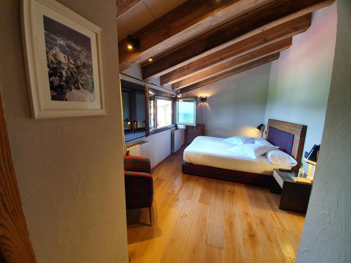 Cama o camas de una habitación en Hotel Boutique Puig Francó - Adults Only
