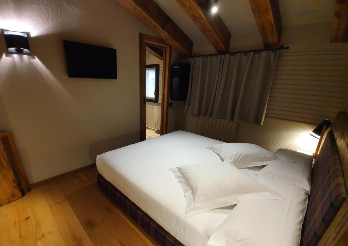 Cama o camas de una habitación en Hotel Boutique Puig Francó - Adults Only