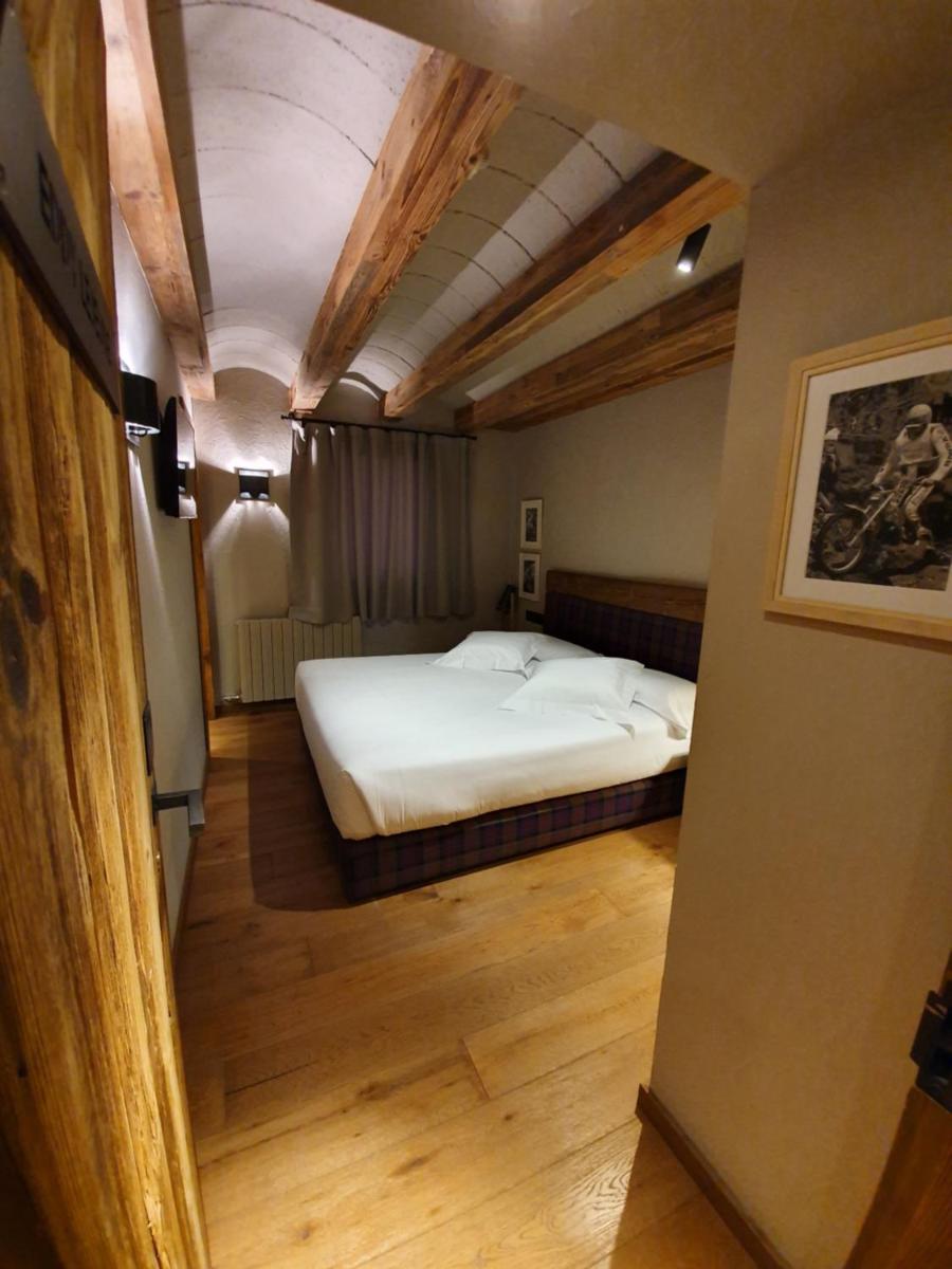 Cama o camas de una habitación en Hotel Boutique Puig Francó - Adults Only
