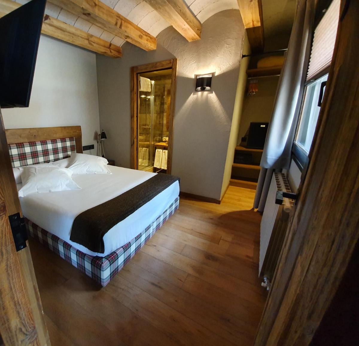 Cama o camas de una habitación en Hotel Boutique Puig Francó - Adults Only