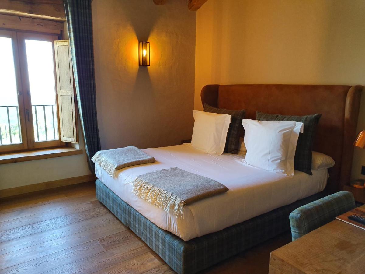 Cama o camas de una habitación en Hotel Boutique Puig Francó - Adults Only