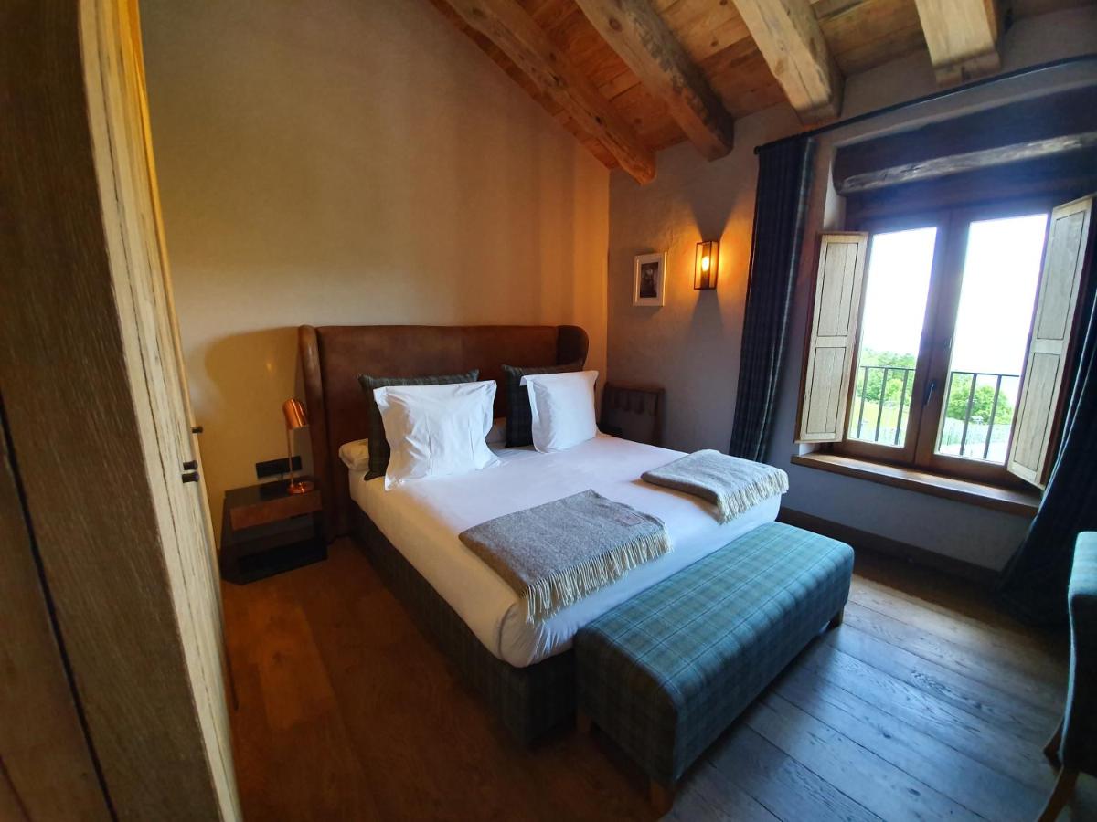 Cama o camas de una habitación en Hotel Boutique Puig Francó - Adults Only