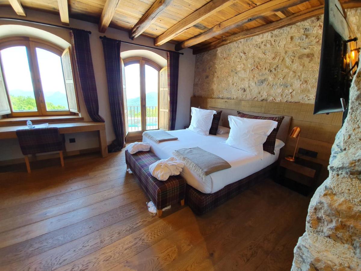 Cama o camas de una habitación en Hotel Boutique Puig Francó - Adults Only