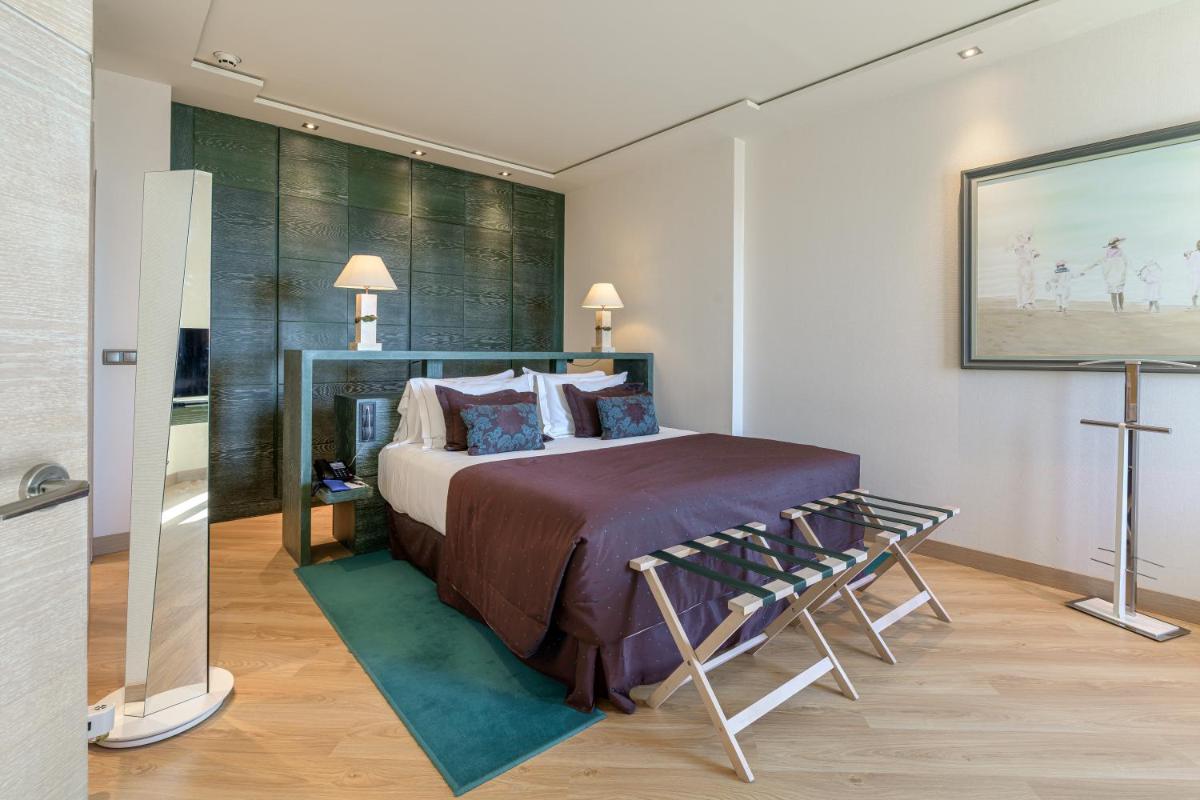 Cama o camas de una habitación en Las Arenas Balneario Resort