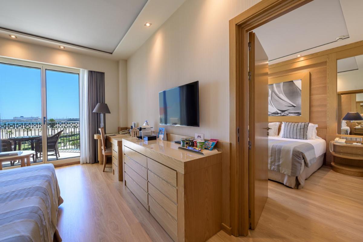Cama o camas de una habitación en Las Arenas Balneario Resort