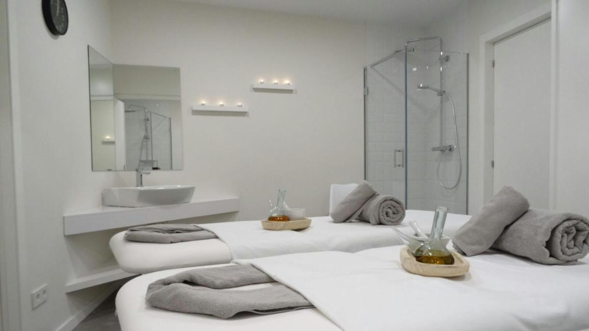 Cama o camas de una habitación en Hotel Spa Odeón