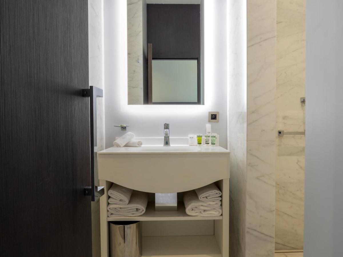 Salle de bains dans l'établissement Villa Genesis