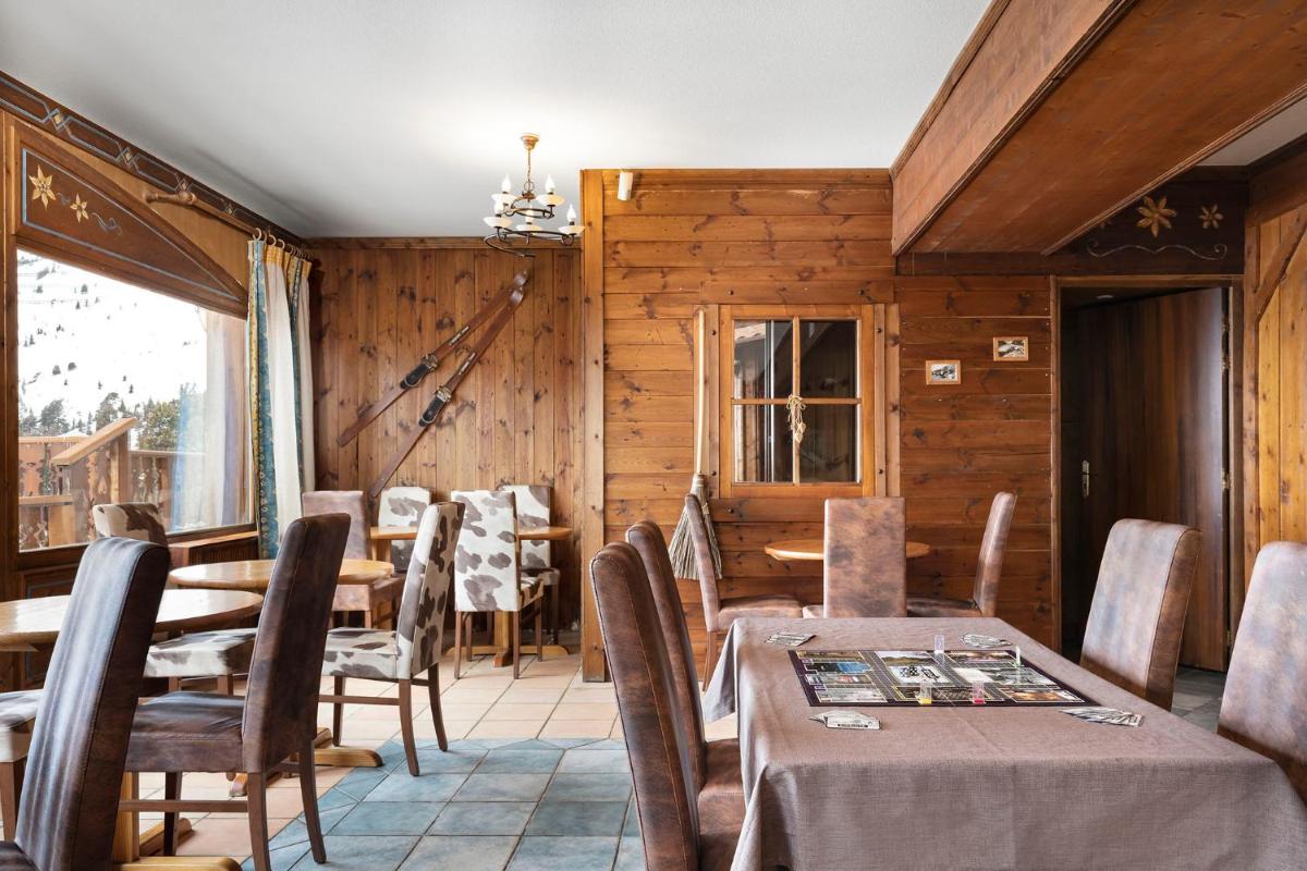 Coin salon dans l'établissement Hôtel Les Balcons Village