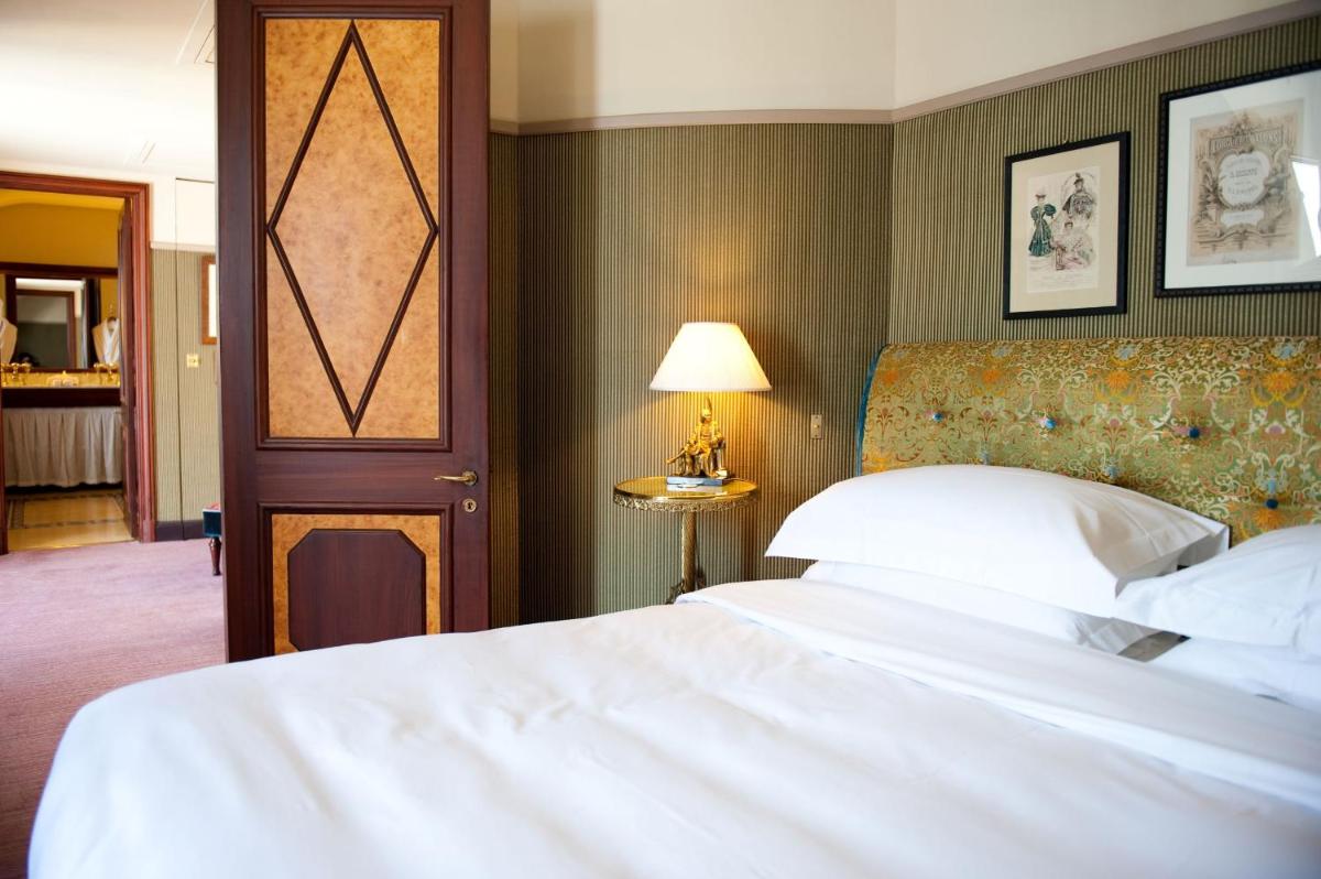 Un ou plusieurs lits dans un hébergement de l'établissement L'Hôtel