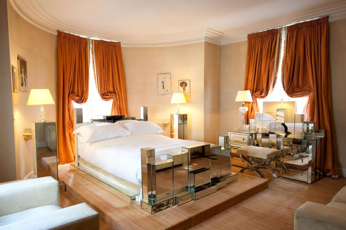 Un ou plusieurs lits dans un hébergement de l'établissement L'Hôtel