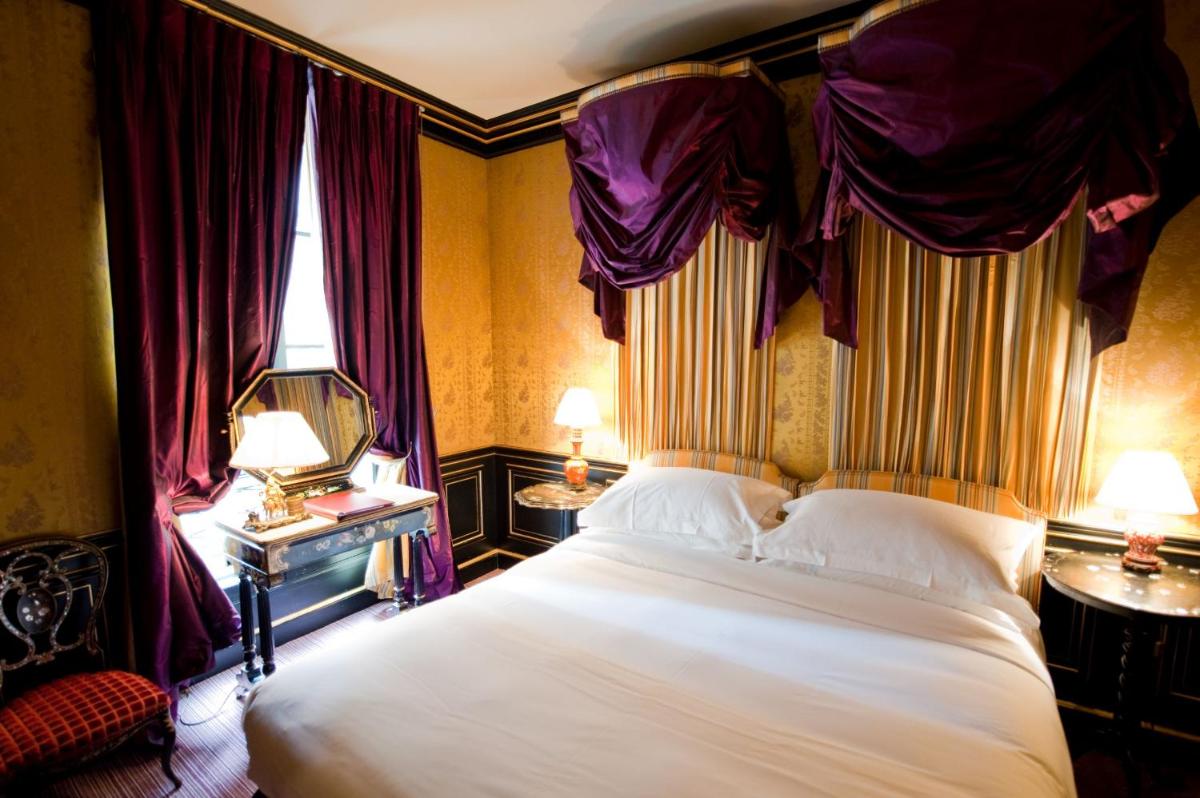 Un ou plusieurs lits dans un hébergement de l'établissement L'Hôtel