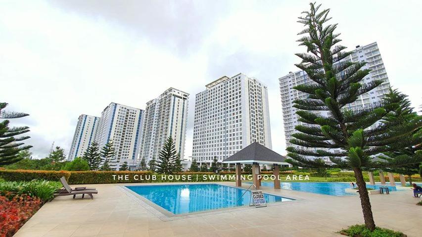 Cozy Condo at Wind Residences - Housity