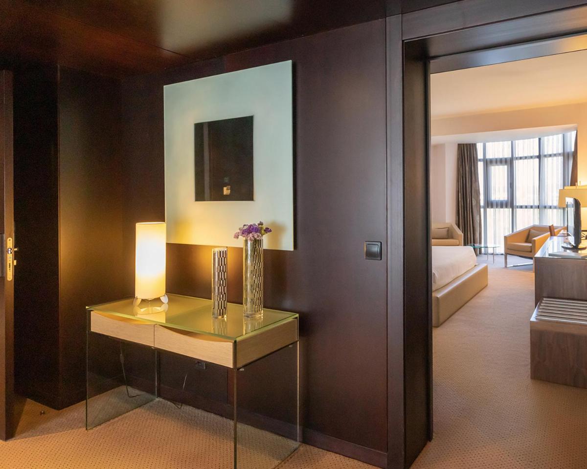 Uma cama ou camas num quarto em Montebelo Viseu Congress Hotel & Spa