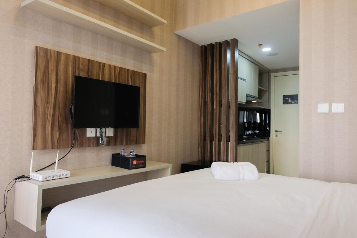 Homey Studio Apartment at M-Town Residence near Summarecon Mall Serpong By Travelio - Housity