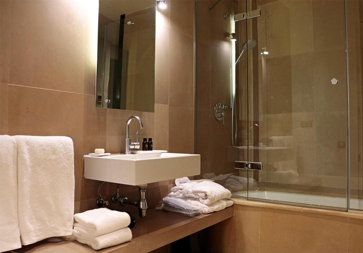 Un baño de EME Catedral Mercer Hotel