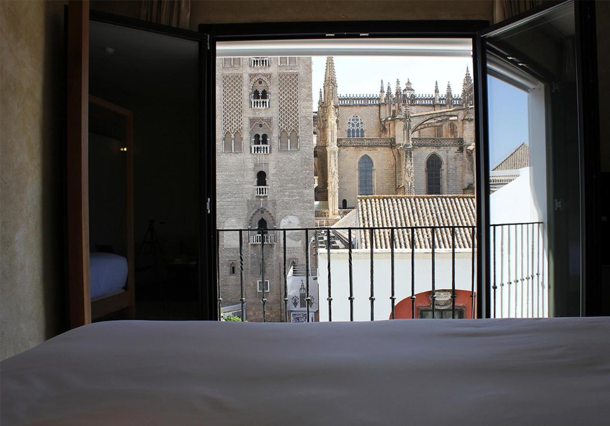 Cama o camas de una habitación en EME Catedral Mercer Hotel