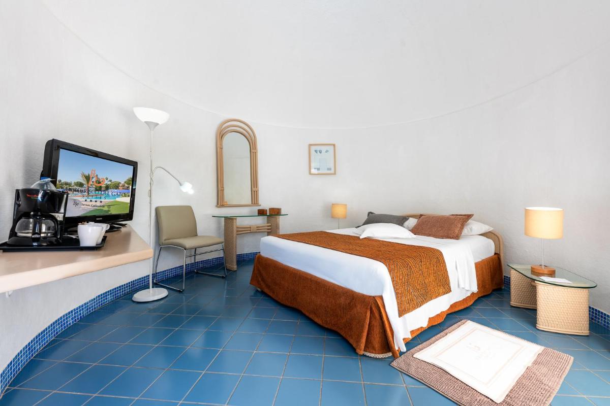 Cama o camas de una habitación en Hotel LIVVO Risco del Gato Suites