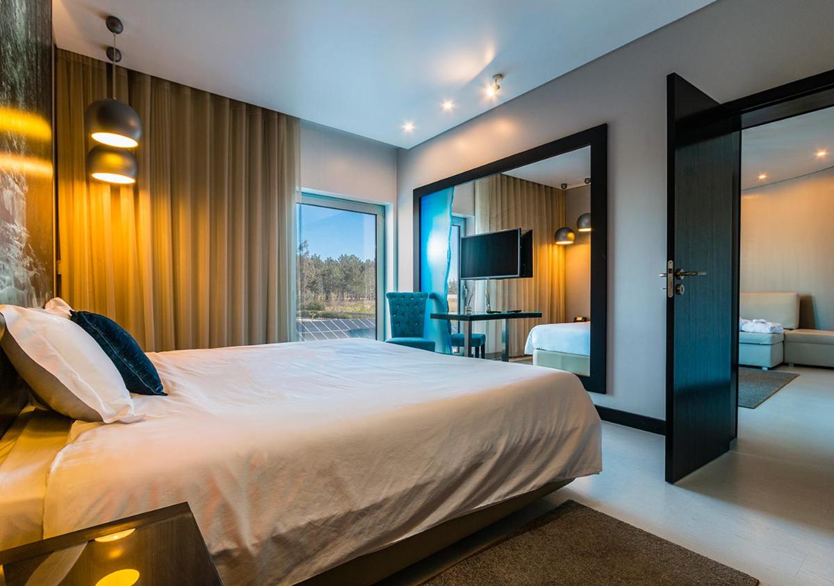 Uma cama ou camas num quarto em Lisotel - Hotel & Spa