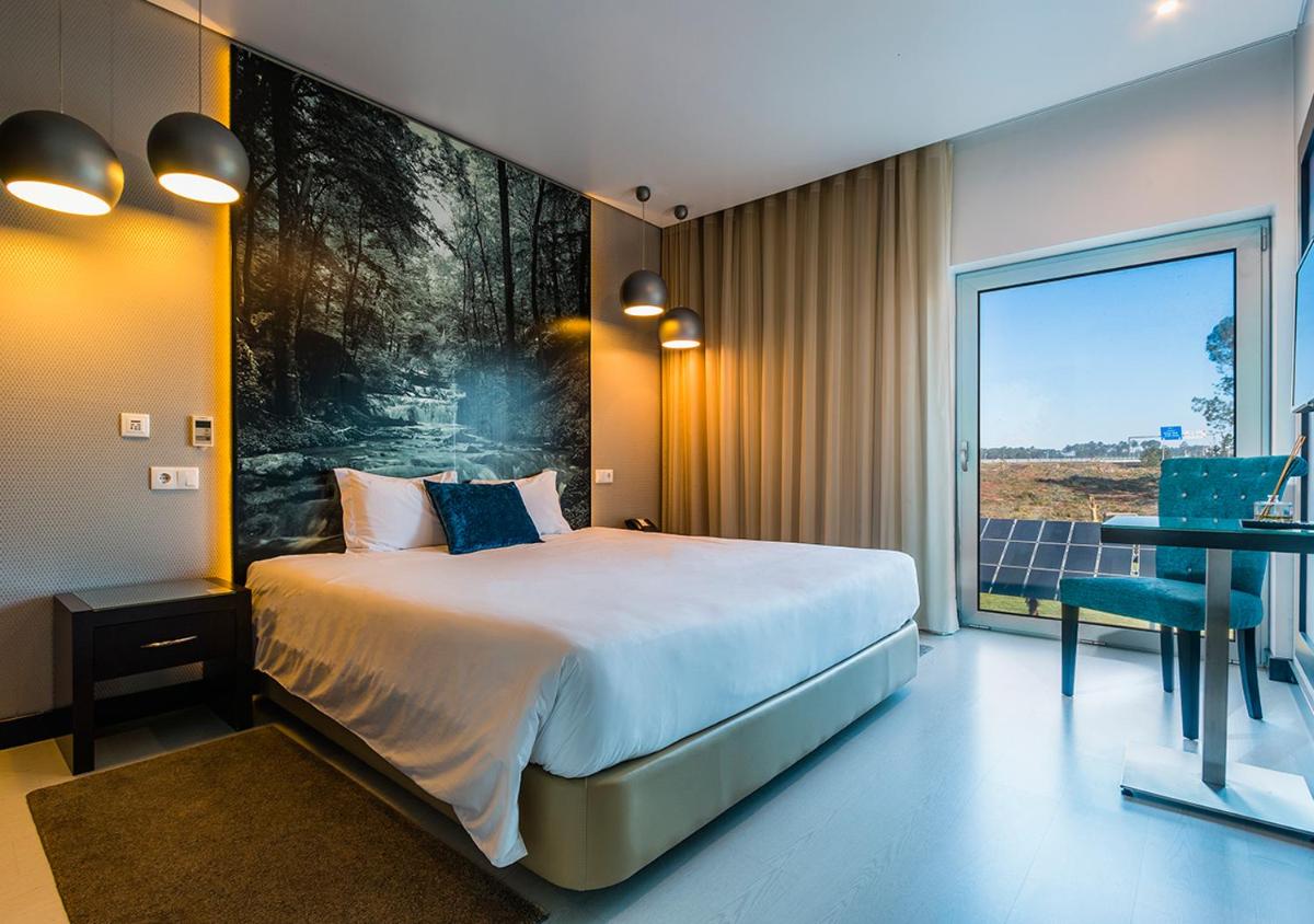 Uma cama ou camas num quarto em Lisotel - Hotel & Spa