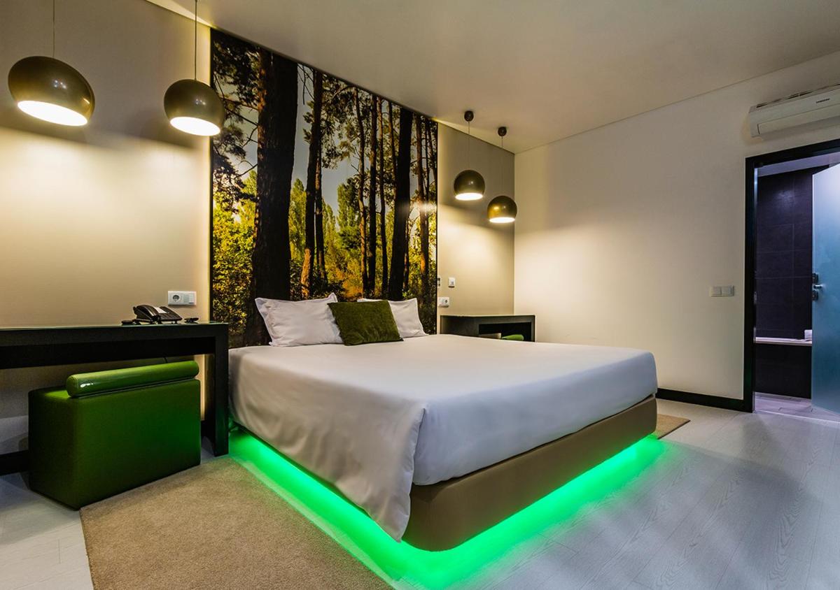 Uma cama ou camas num quarto em Lisotel - Hotel & Spa