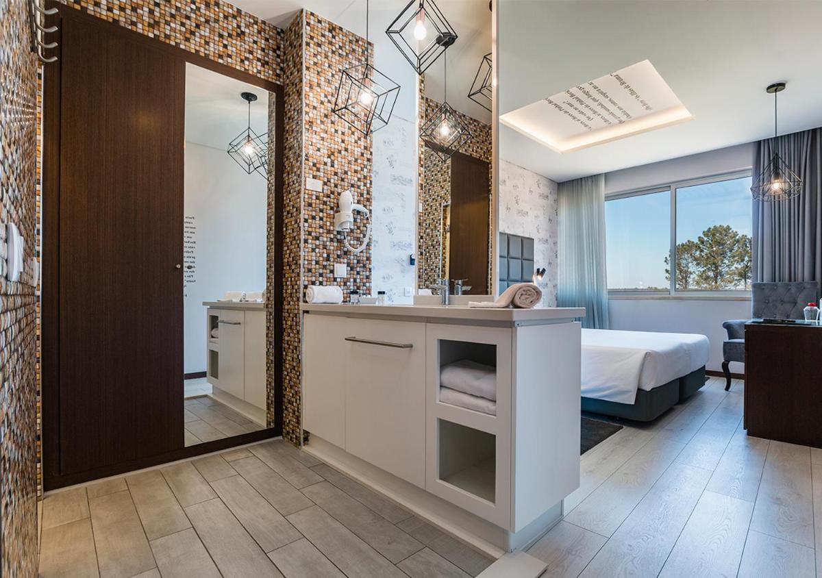 Uma cama ou camas num quarto em Lisotel - Hotel & Spa