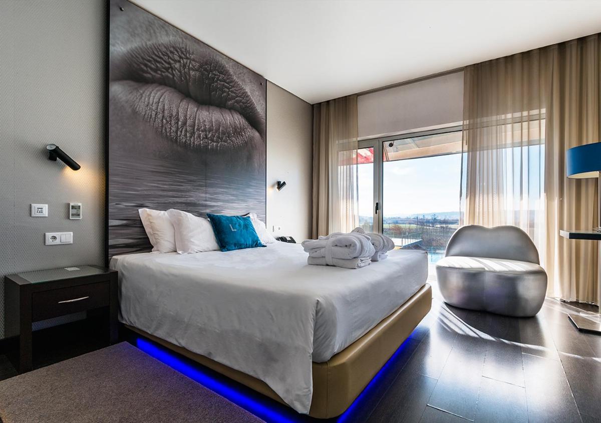 Uma cama ou camas num quarto em Lisotel - Hotel & Spa