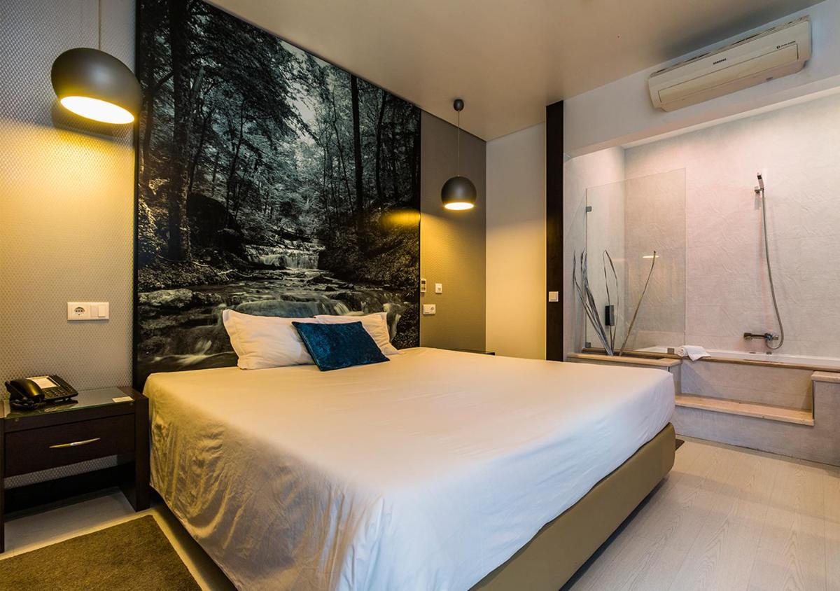 Uma cama ou camas num quarto em Lisotel - Hotel & Spa