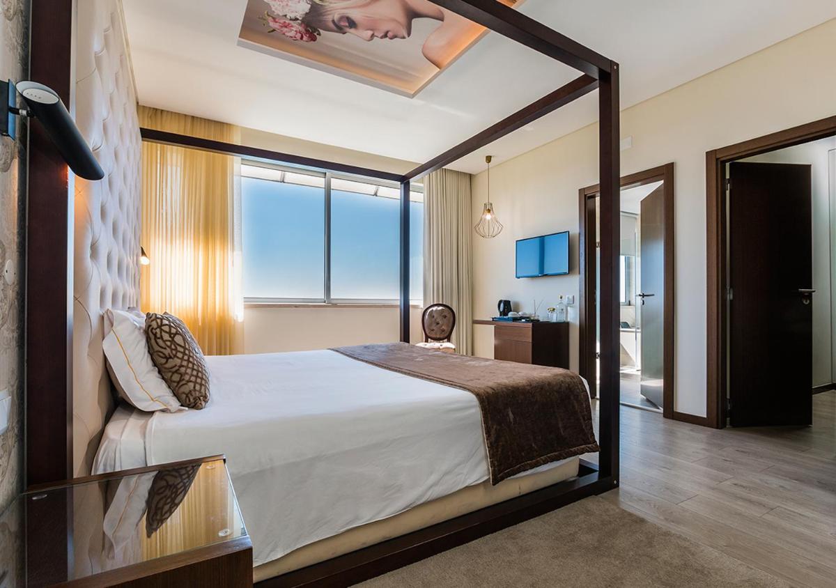 Uma cama ou camas num quarto em Lisotel - Hotel & Spa