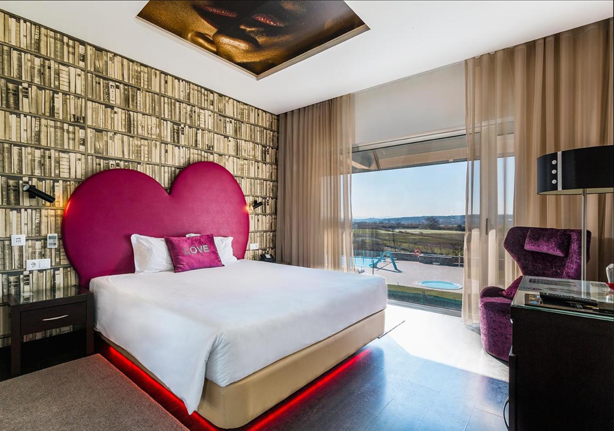 Uma cama ou camas num quarto em Lisotel - Hotel & Spa