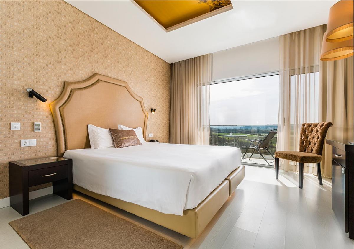Uma cama ou camas num quarto em Lisotel - Hotel & Spa