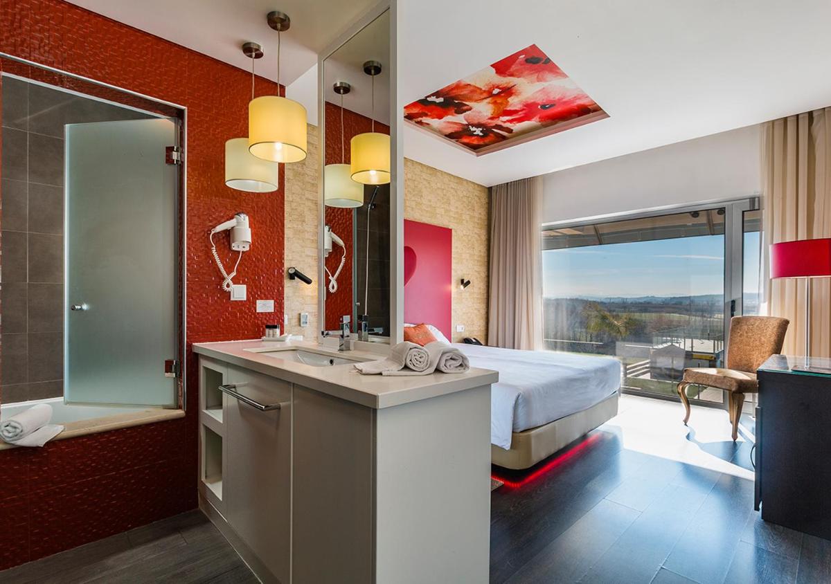 Uma cama ou camas num quarto em Lisotel - Hotel & Spa