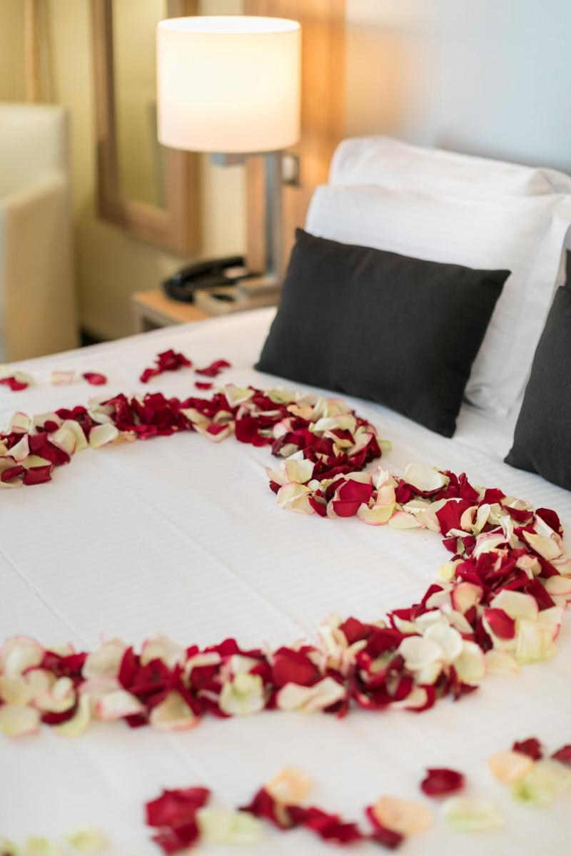 Un ou plusieurs lits dans un hébergement de l'établissement 7Hotel&Spa