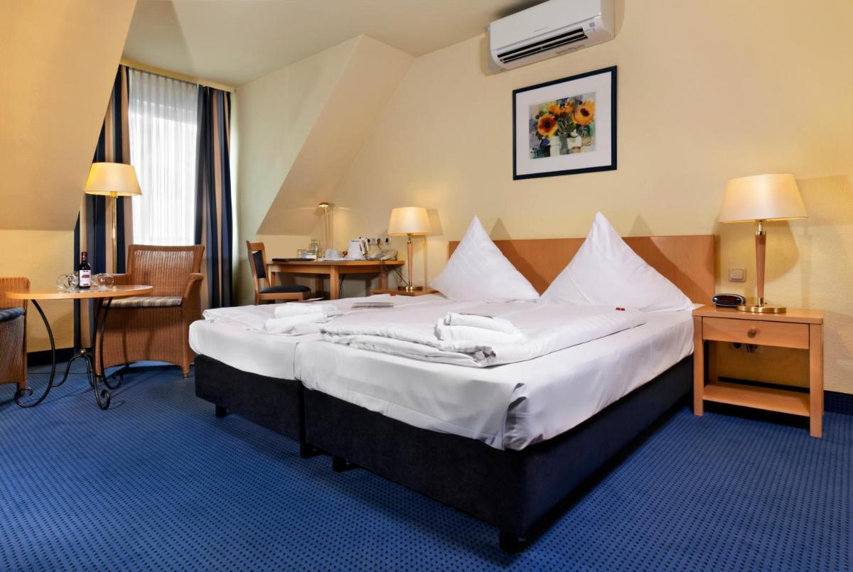 Tryp by Wyndham Luebeck Aquamarin - Housity