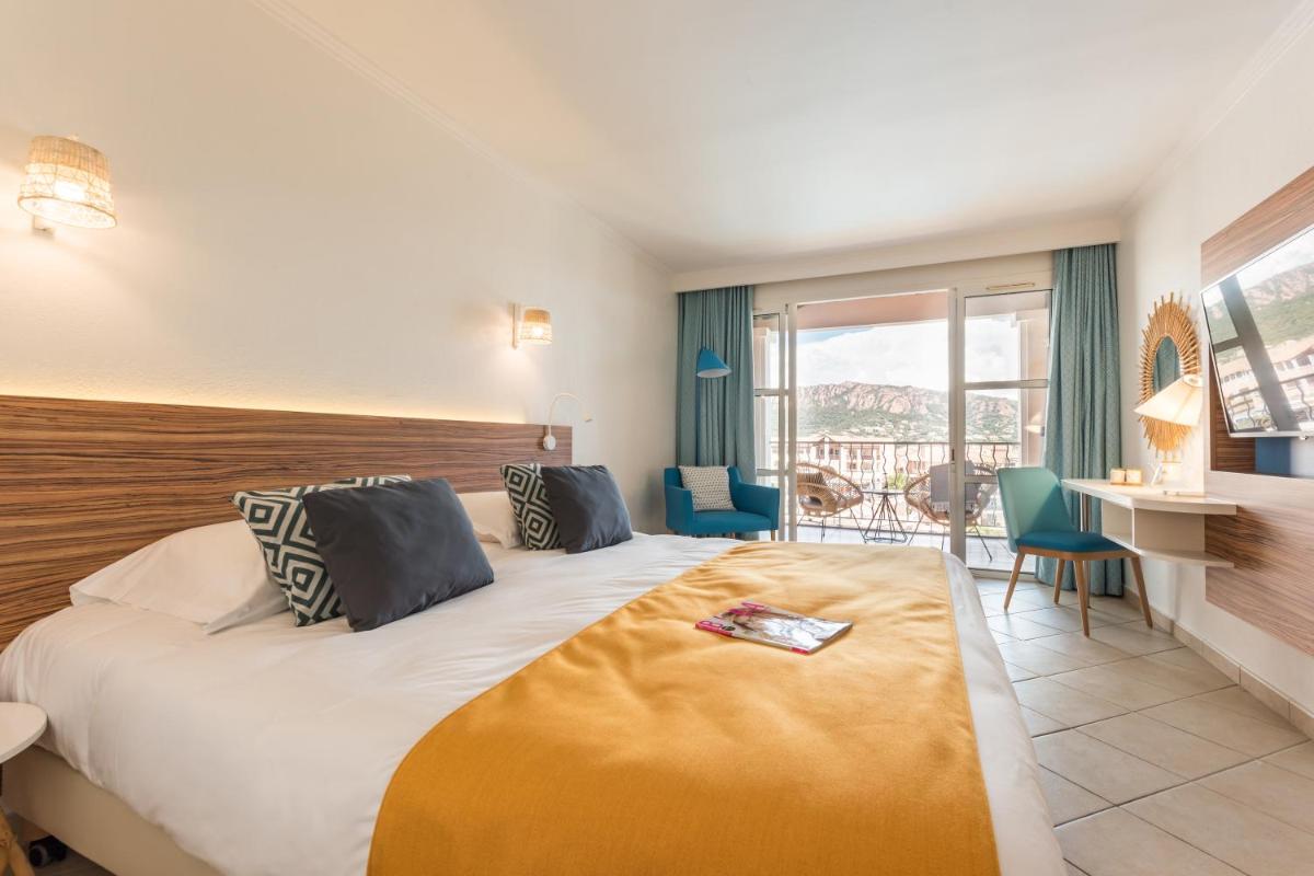 Un ou plusieurs lits dans un hébergement de l'établissement Hôtel de l'Esterel Pierre & Vacances