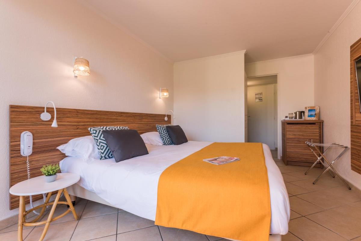 Un ou plusieurs lits dans un hébergement de l'établissement Hôtel de l'Esterel Pierre & Vacances