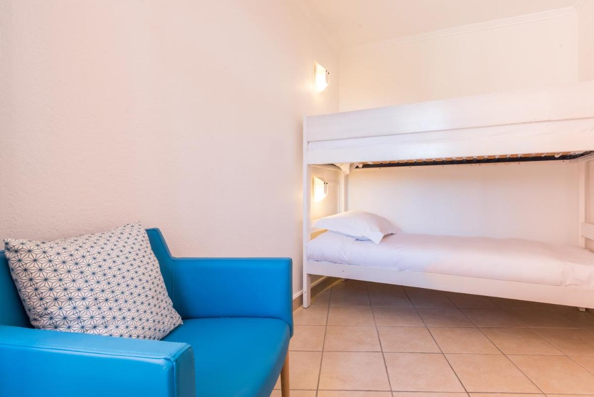 Un ou plusieurs lits dans un hébergement de l'établissement Hôtel de l'Esterel Pierre & Vacances