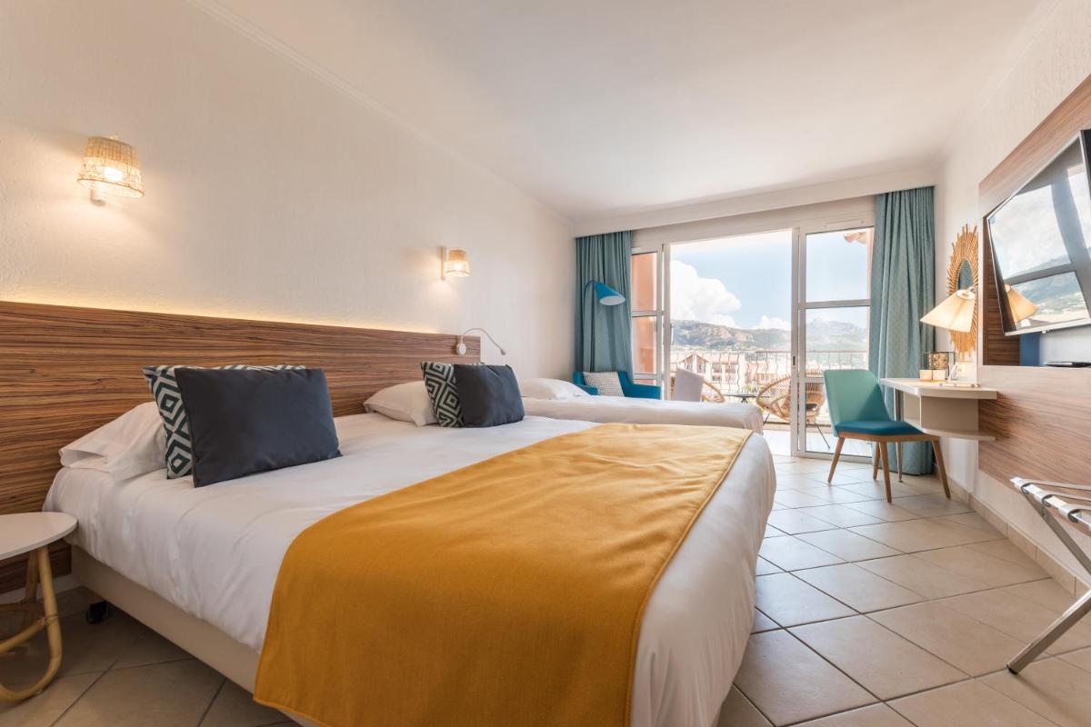 Un ou plusieurs lits dans un hébergement de l'établissement Hôtel de l'Esterel Pierre & Vacances