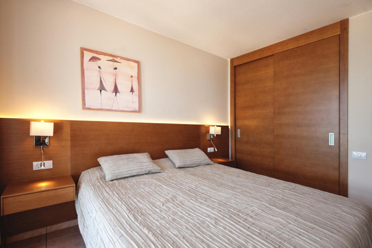 Cama o camas de una habitación en Sotavento Beach Club