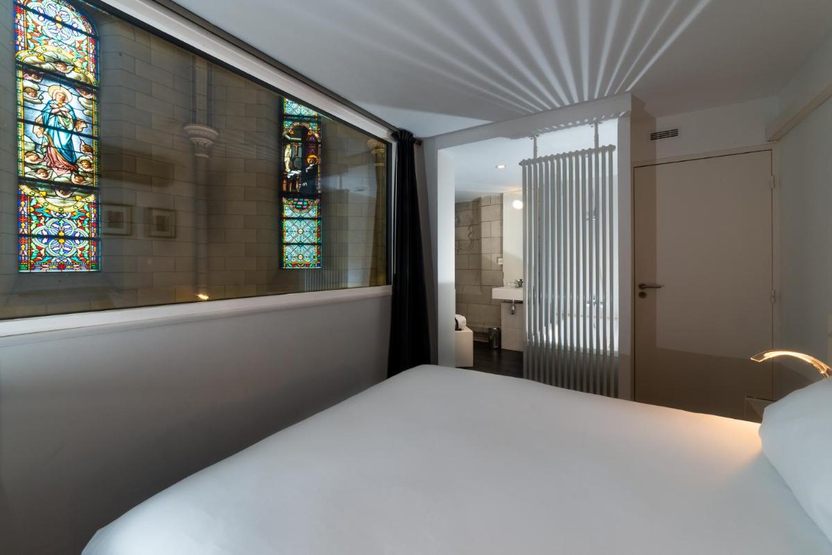 Un ou plusieurs lits dans un hébergement de l'établissement SOZO Hotel