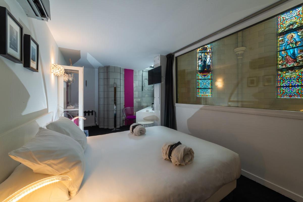 Un ou plusieurs lits dans un hébergement de l'établissement SOZO Hotel